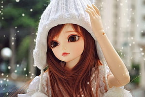 Cute Ball Jointed Doll in White Knit Beanie with Snow Effect HD wallpaper