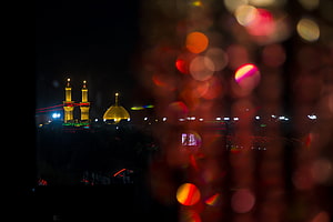 Karbala Shrine Illuminated at Night with Bokeh Light Effects HD wallpaper