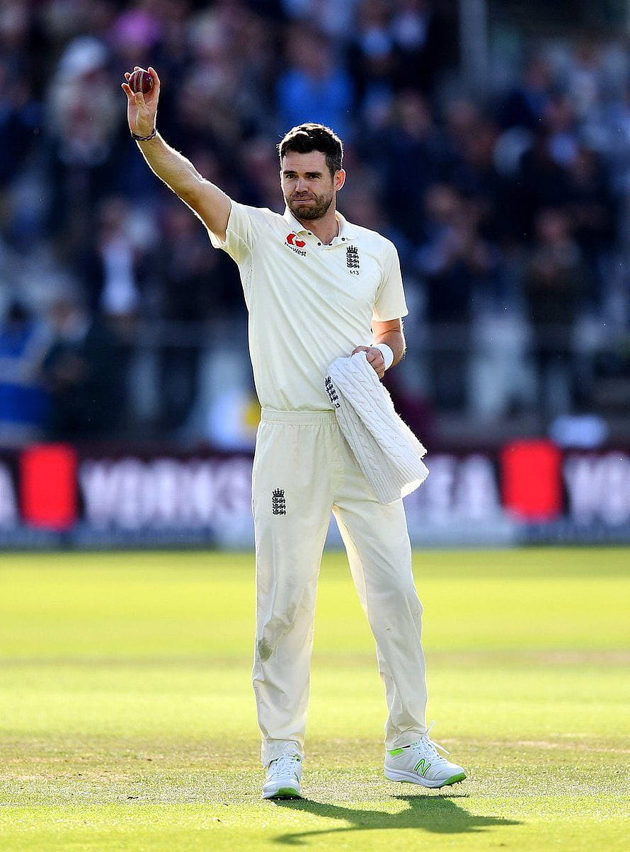 James Anderson in England Test Kit Holding Ball and Sweater on the Cricket Field HD phone wallpaper