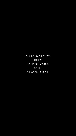 Minimalist Black Background with White Text Quote About Soul Fatigue and Rest HD phone wallpaper
