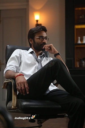 Vip Dhanush in a thoughtful pose from the film Velaiyilla Pattathari HD phone wallpaper