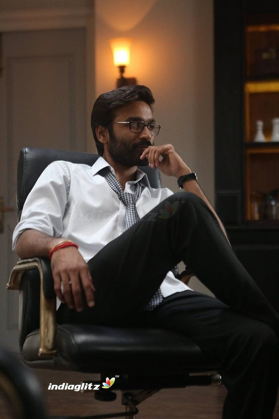Vip Dhanush in a thoughtful pose from the film Velaiyilla Pattathari HD phone wallpaper