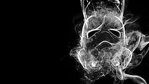Ethereal Smoke Skull with Glowing Eyes on Black Background HD wallpaper