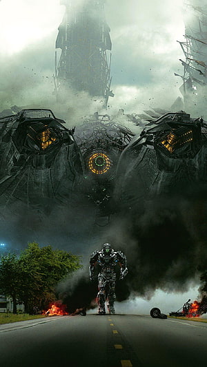 Lockdown and Bumblebee from Transformers Age of Extinction on a Wasteland Road HD phone wallpaper