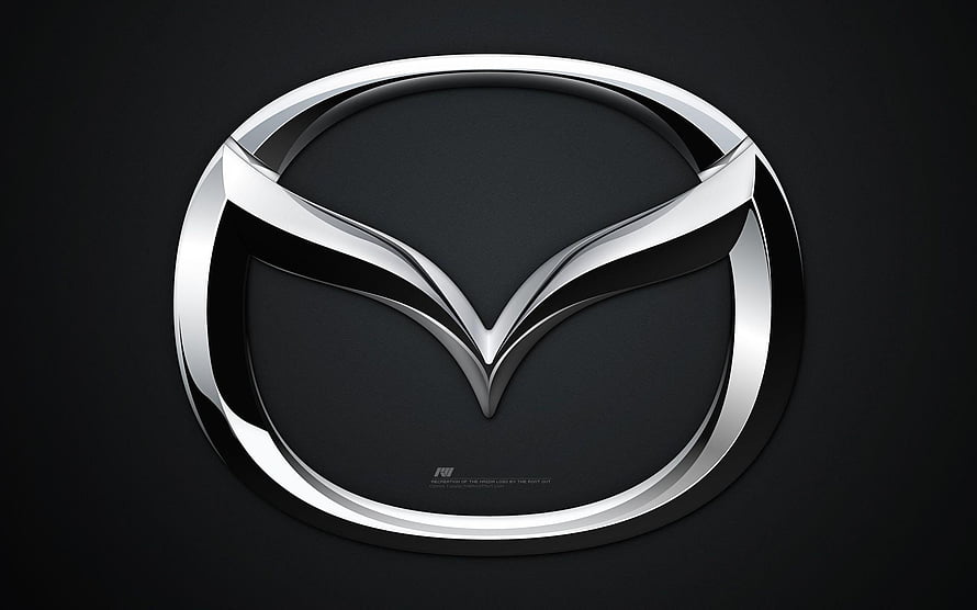 Mazda Emblem in Polished Chrome on a Dark Background HD wallpaper
