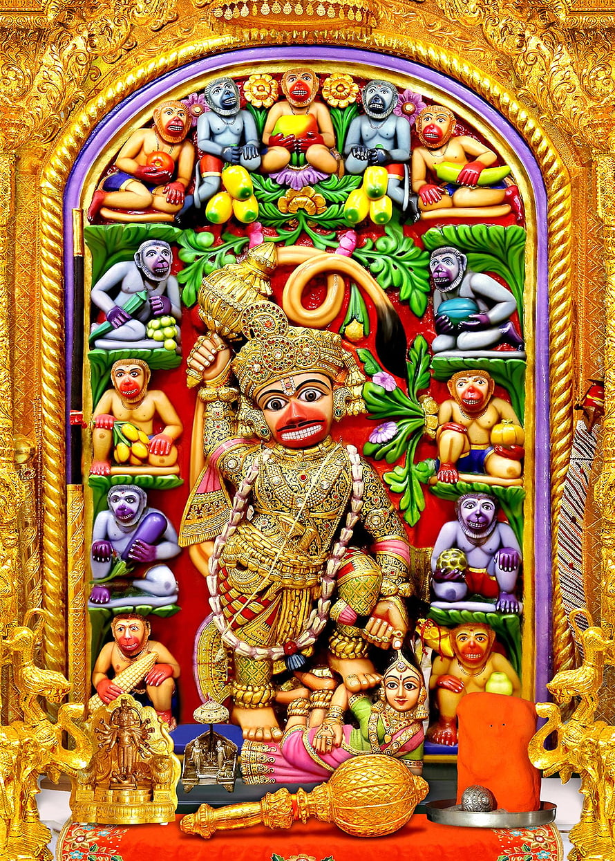 Kasturhanjan Deity Statue Surrounded by Vanara Figures in Ornate Golden Temple Frame HD phone wallpaper