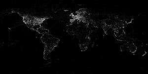 Illuminated World Map at Night with City Lights on Black Background HD wallpaper