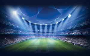 Illuminated Soccer Stadium Interior With Full Crowd And Bright Floodlights HD wallpaper