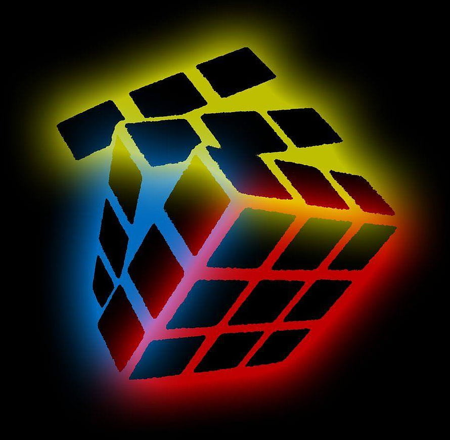Neon Glowing Rubik's Cube with Vibrant Rainbow Light Trails on Black Background HD wallpaper