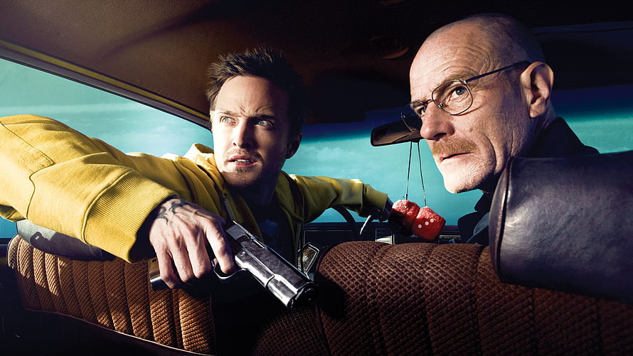 Breaking Bad: Walter White and Jesse Pinkman in a tense car scene with a pistol HD wallpaper
