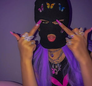 Purple Hair and Black Ski Mask Portrait with Butterfly Embellishments HD wallpaper