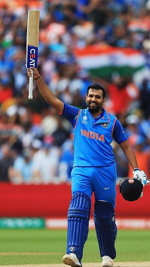 Rohit Sharma Celebrating with Bat and Helmet in India Cricket Jersey HD phone wallpaper