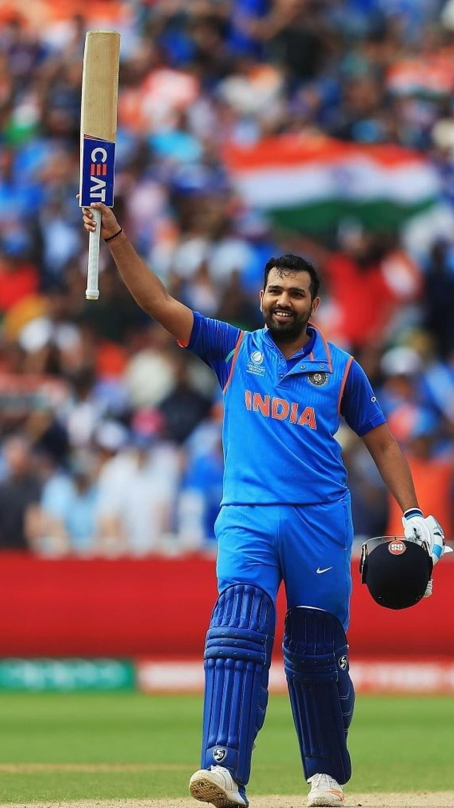 Rohit Sharma Celebrating with Bat and Helmet in India Cricket Jersey HD phone wallpaper
