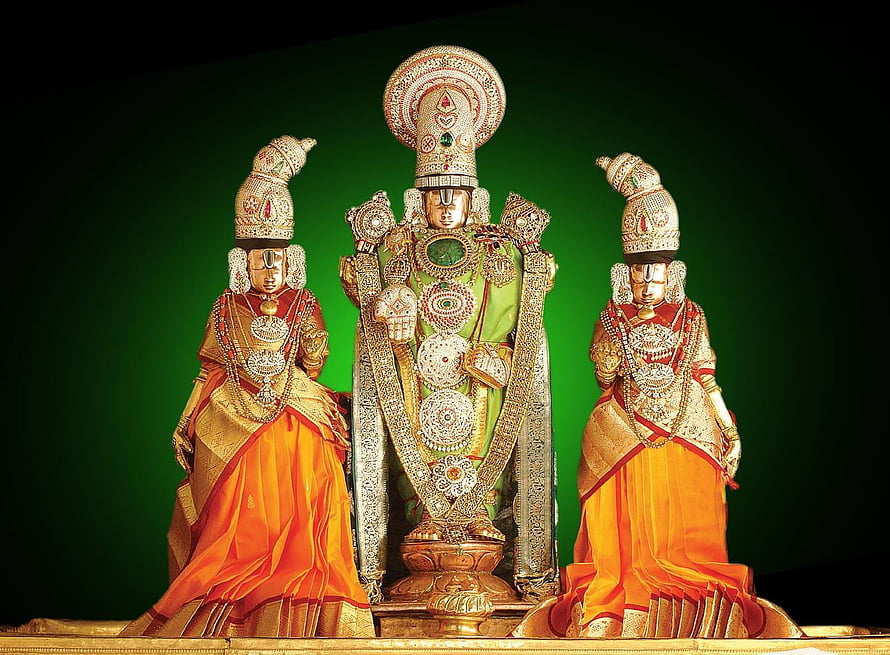Lord Venkateswara Temple Deity with Consorts in Ornate Gold and Silk Attire HD wallpaper