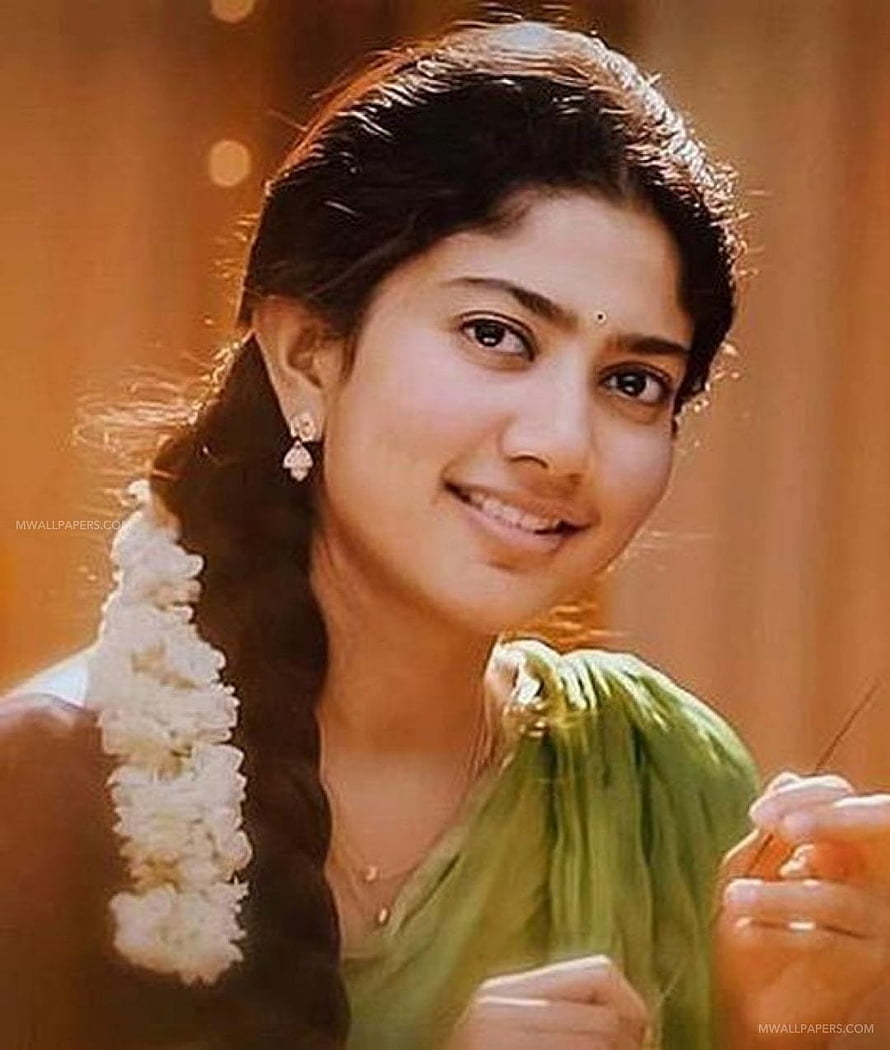 Sai Pallavi in a green saree with a long braid and white flower garland HD phone wallpaper