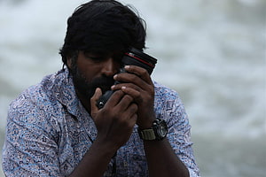 96 Movie Still: Man Photographing Waterfall in Blue Patterned Shirt HD wallpaper