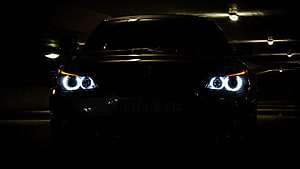 BMW M5 E60 Front Headlights in Dark Parking Garage HD wallpaper