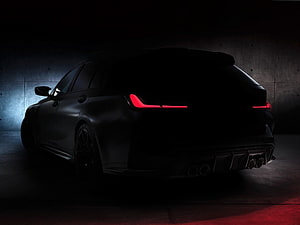 BMW M3 Touring G81 Rear View in Dark Studio with Red Taillights HD wallpaper