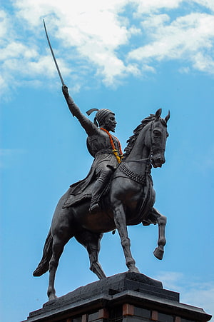 Shivaji Maharaj Equestrian Statue Holding Sword Against Blue Sky HD phone wallpaper