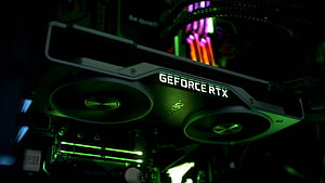 Nvidia GeForce RTX 2060 graphics card with green RGB lighting inside a custom PC build HD wallpaper