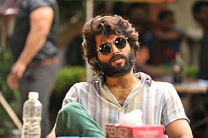 Arjun Reddy Character Portrait in Round Sunglasses and Striped Shirt HD wallpaper