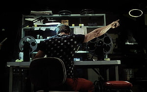 Fight Club Film Still: Man in Star Shirt at Film Editing Desk HD wallpaper