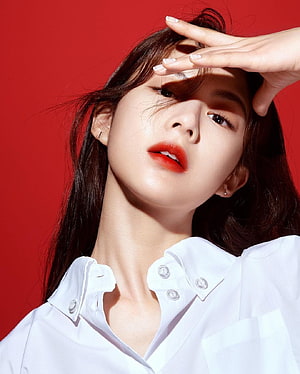 Go Yoon Jung Portrait in White Shirt Against Red Background HD phone wallpaper