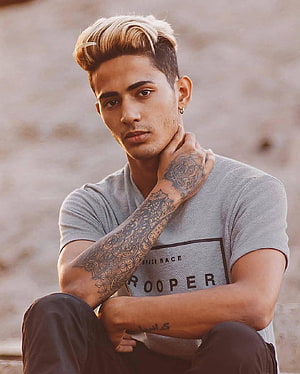 Danish Zehen Portrait With Intricate Arm Tattoos And Styled Blonde Hair HD phone wallpaper