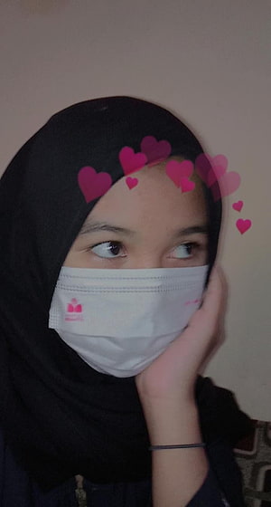 Young woman in black hijab and white face mask with pink heart filter overlay HD phone wallpaper