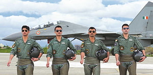 Indian Air Force Pilots Standing in Front of a Tejas Fighter Jet on the Tarmac HD wallpaper