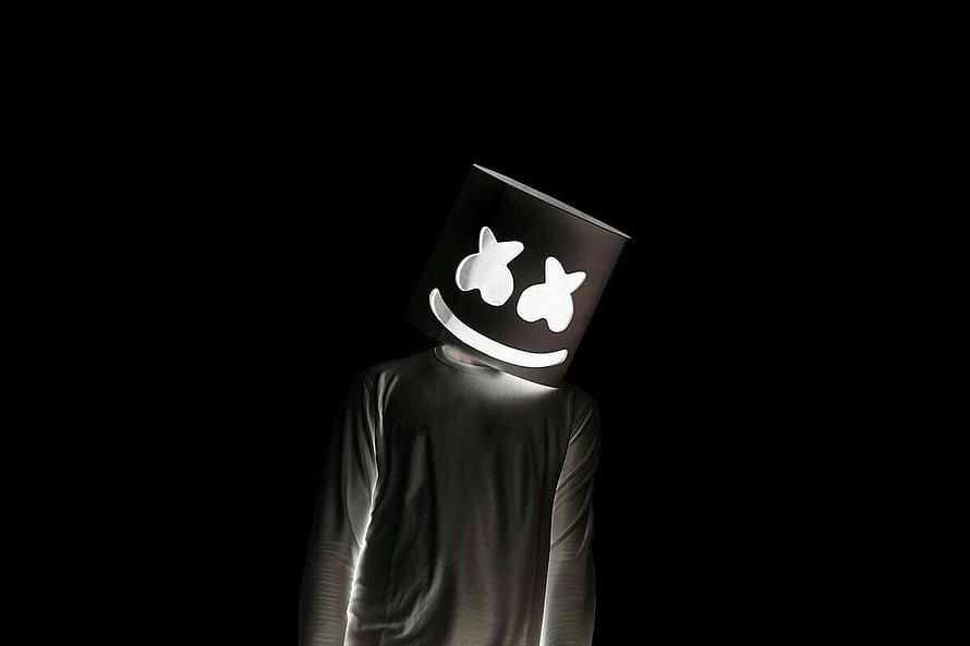 Marshmello DJ Wearing Iconic White Mask Against Dark Background HD wallpaper