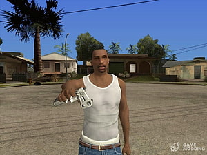 Carl Johnson from GTA San Andreas holding a silver revolver in a suburban street scene HD wallpaper