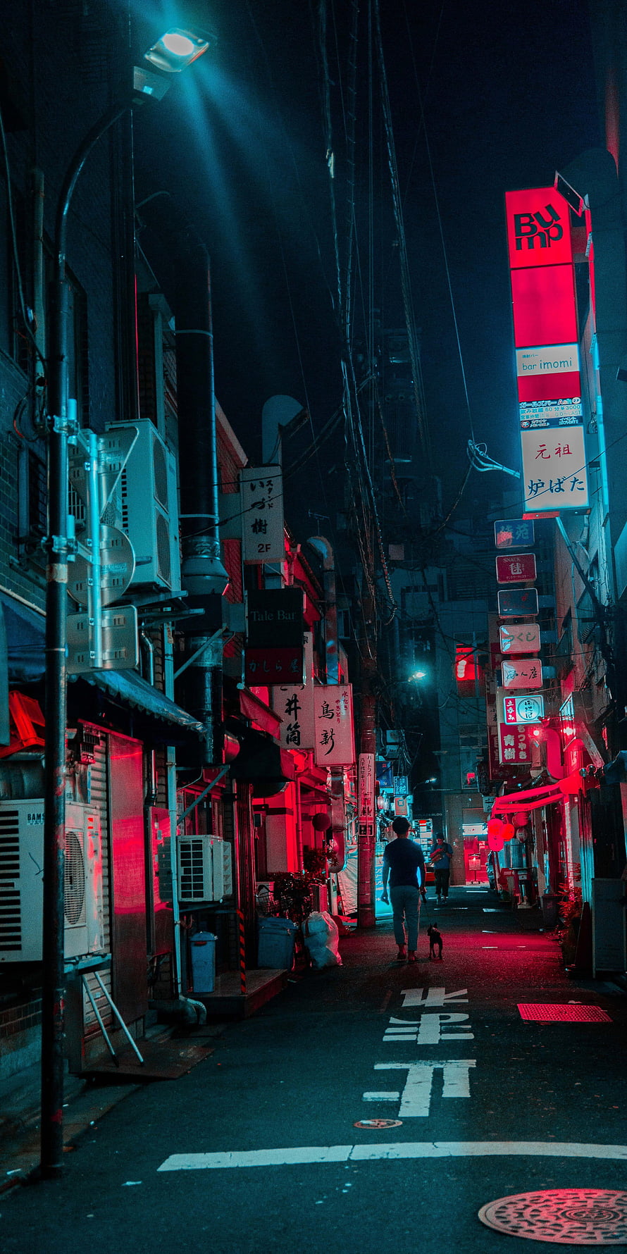Neon-lit Tokyo alleyway at night with glowing signs and a lone pedestrian walking a small dog HD phone wallpaper