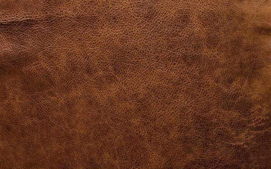 Rich Brown Leather Texture Close-Up with Natural Grain and Creases HD wallpaper