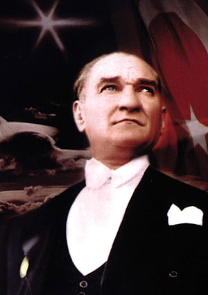 Mustafa Kemal Atatürk in Formal Attire with Turkish Flag and Star Background HD phone wallpaper