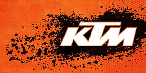 KTM Motorcycle Brand Logo on Orange Hexagonal Background with Black Ink Splatter HD wallpaper