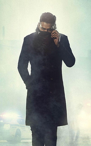 Prabhas in Saaho: Mysterious Man in Black Coat and Mask Amidst Fog HD phone wallpaper