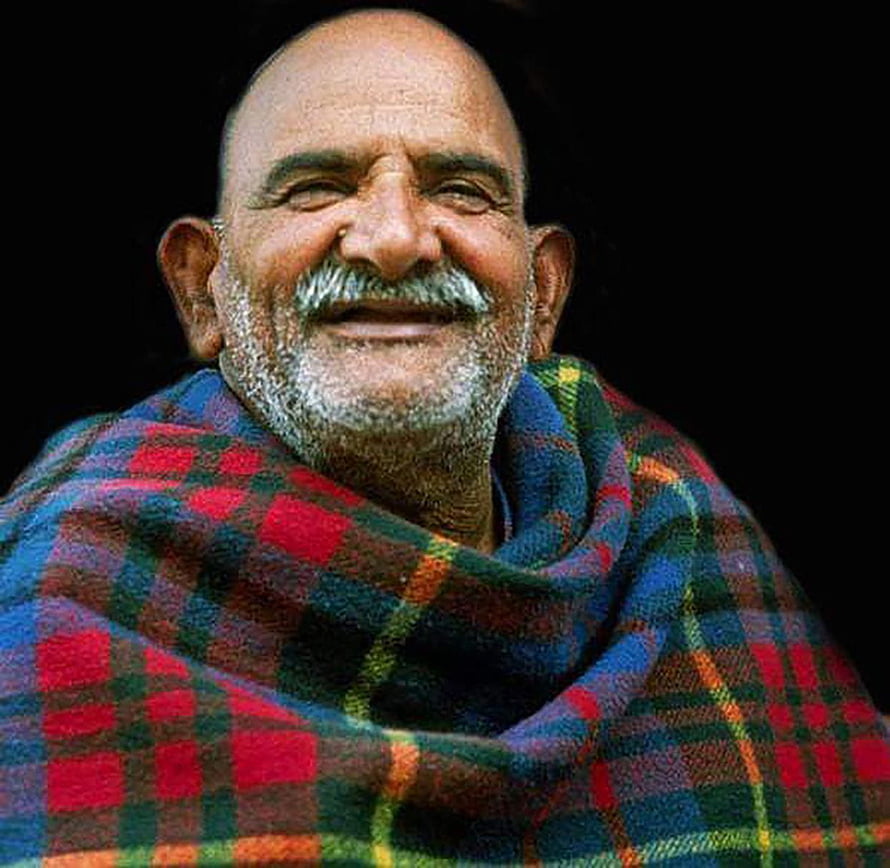 Neem Karoli Baba Portrait in Traditional Plaid Shawl HD wallpaper