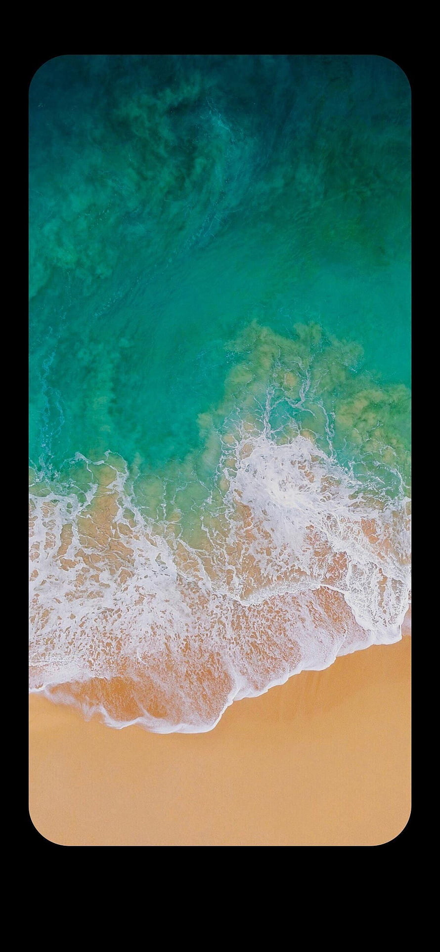 Aerial View of Turquoise Ocean Waves Rolling onto Golden Sandy Beach HD phone wallpaper