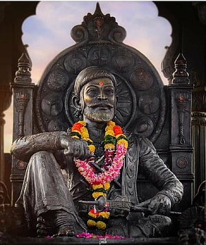 Chhatrapati Shivaji Maharaj Statue Adorned With Marigold Garlands Seated On Ornate Throne HD phone wallpaper