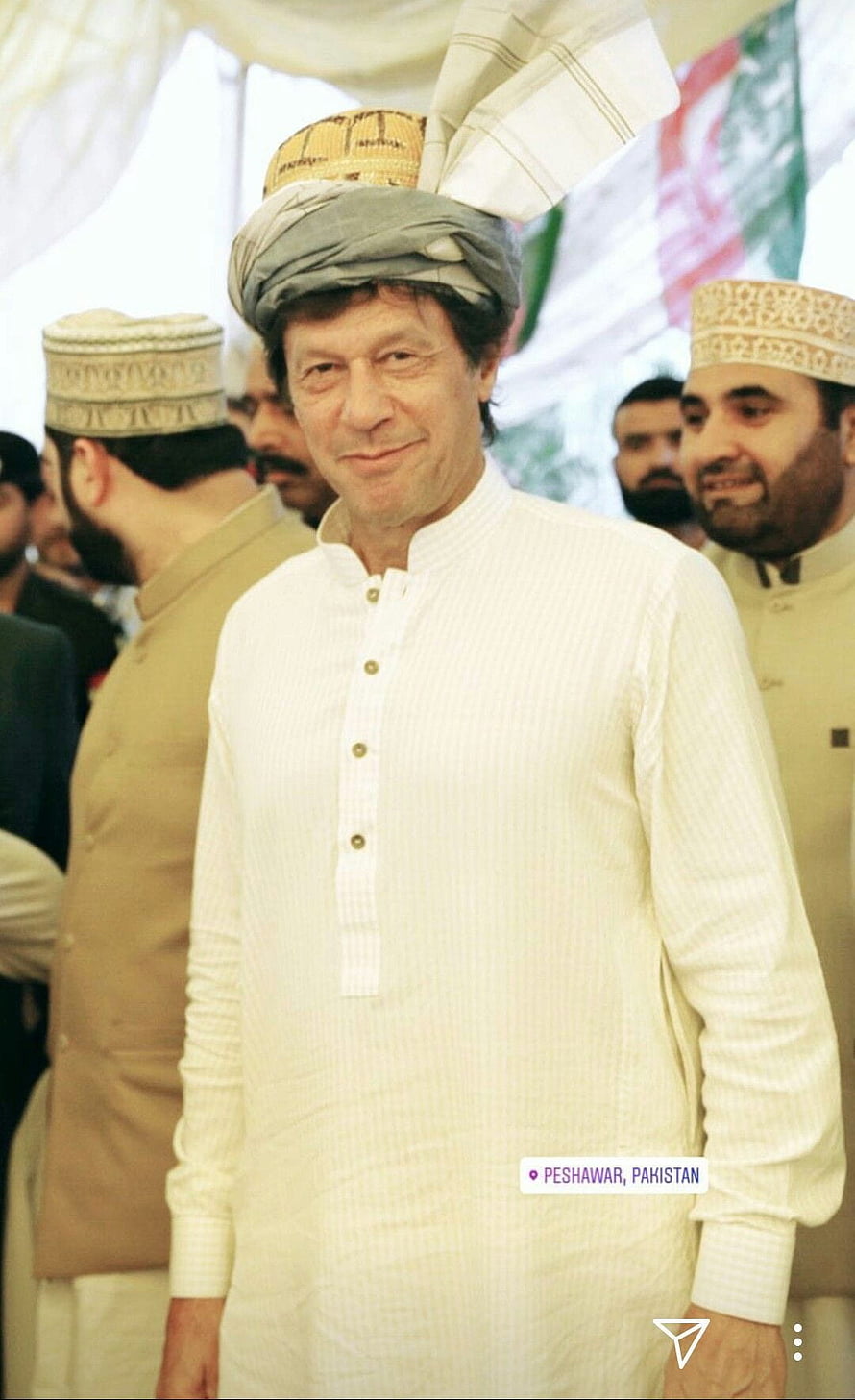 Imran Khan in Traditional White Shalwar Kameez and Turban at a Public Gathering in Peshawar HD phone wallpaper