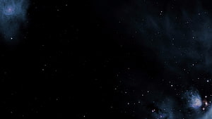 Deep Space Nebula and Star Field Against a Dark Cosmic Void HD wallpaper
