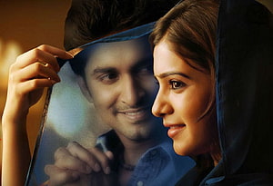 Naan Ee Movie Poster Featuring Sushant and Shruti Haasan in Romantic Profile HD wallpaper