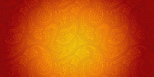 Warm Orange and Red Paisley Pattern with Intricate Floral Motifs and Central Glow HD wallpaper