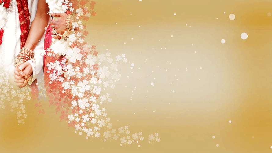 Indian Wedding Couple Holding Hands with Floral Overlay on Golden Background HD wallpaper