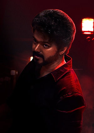 Vijay in Dramatic Red-Lit Portrait with Intense Gaze and Dark Shirt HD phone wallpaper