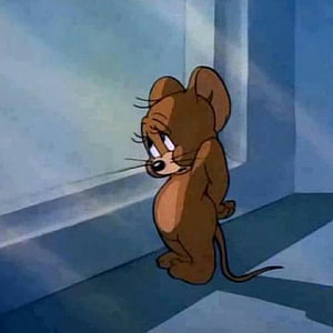 Sad Jerry Mouse from Tom and Jerry Standing Alone in a Blue Room HD phone wallpaper