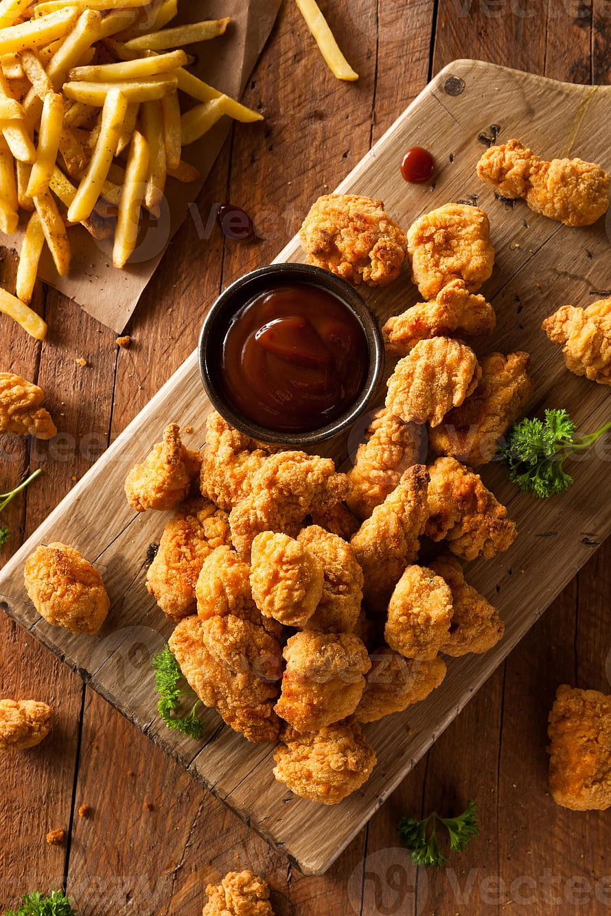 Golden Crispy Popcorn Chicken with French Fries and BBQ Sauce on Rustic Wooden Board HD phone wallpaper