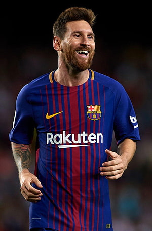 Lionel Messi Smiling in Barcelona Home Kit with Rakuten Sponsor HD phone wallpaper