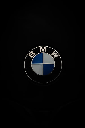 BMW Emblem Close-Up on Black Background with Blue and White Quadrants HD phone wallpaper